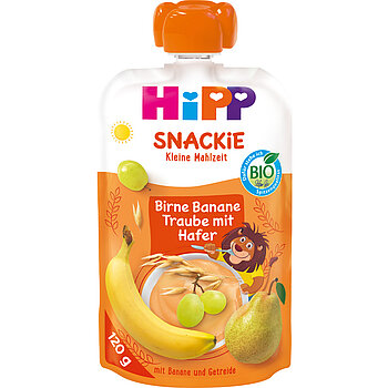 Bijelo-narančasta vrećica za grickalice s crtanim lavom, bananom, kruškom i grožđem, a na vrhu je otisnut tekst "HiPP Bio für Kinder" i "SNACKIE".