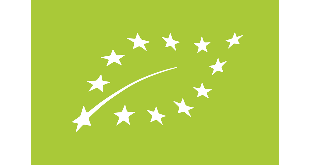 A white star is moving through a circle of white stars against a green background.