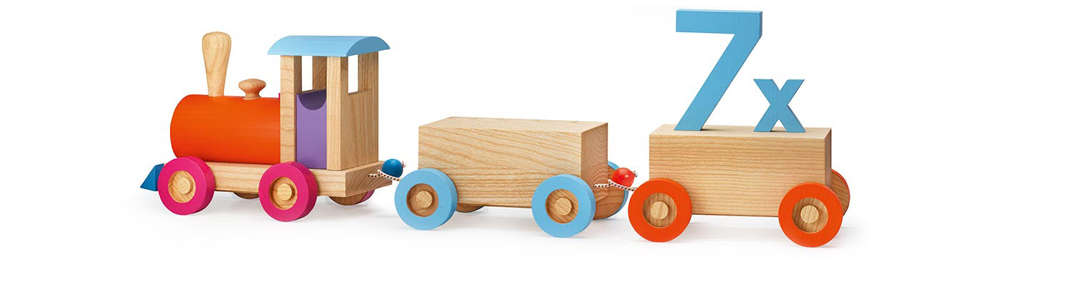 A wooden toy train with colorful wheels and a blue number 7x on a wooden block.