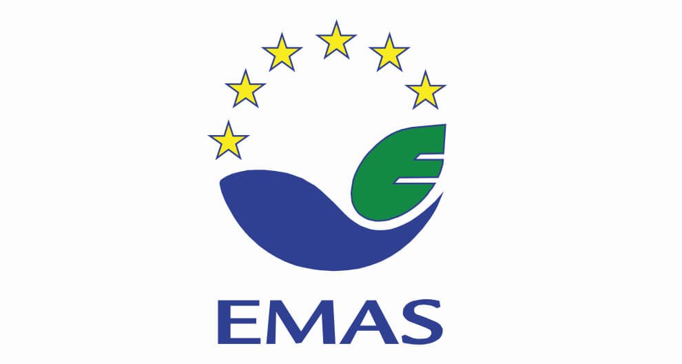 A logo with a stylized leaf and a circle of stars, accompanied by the text "EMAS" below.