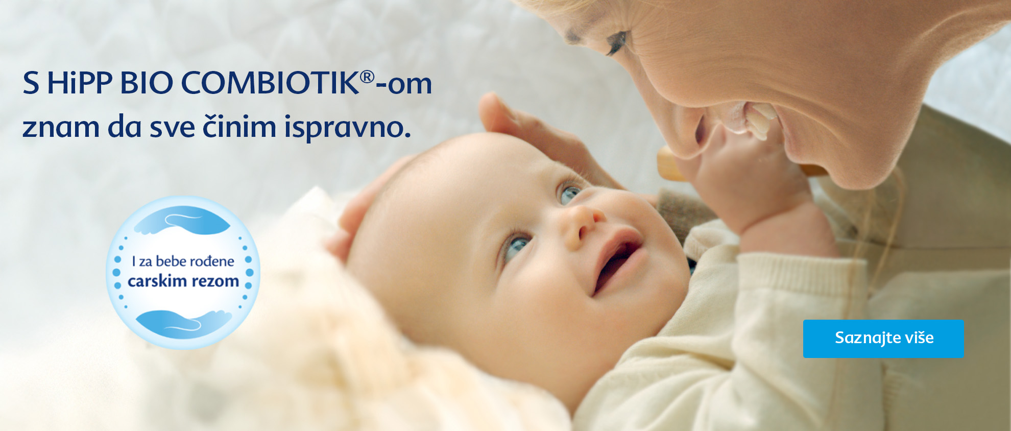 Žena s ljubavlju komunicira s bebom, uz logotip i tekst koji se preklapaju.