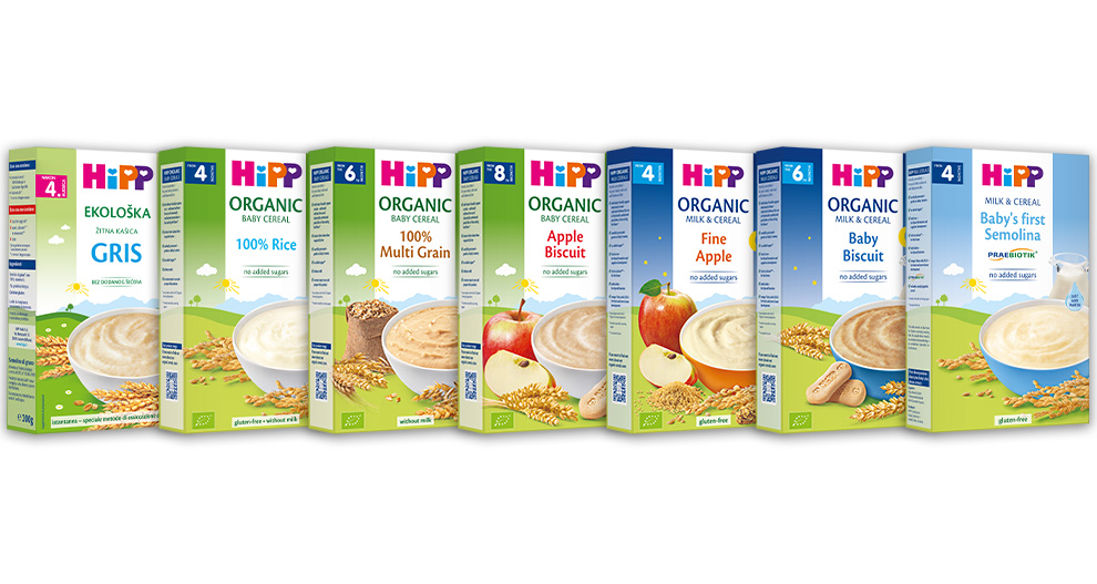 Kolekcija od osam kutija dječje hrane marke 'HiPP', svaka s posebnim okusom i nutritivnim informacijama.